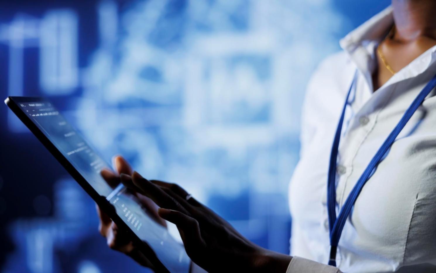 Smart city control center with multiple monitoring screens displaying urban infrastructure data